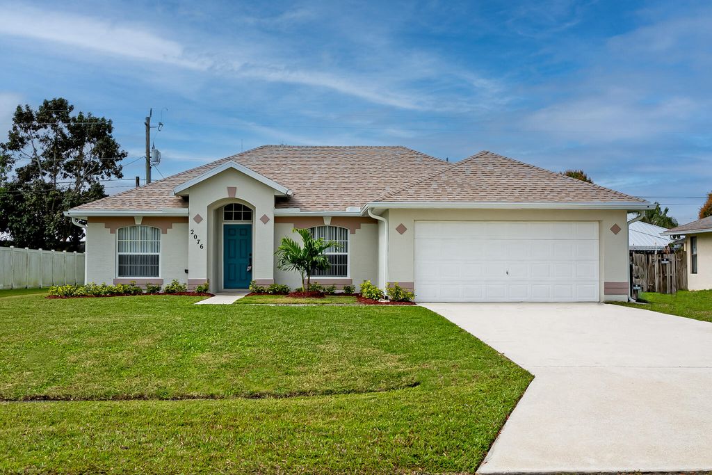 Photo of 2076 SE Camilo Street, Port Saint Lucie, FL 34952 (MLS # R10962434)