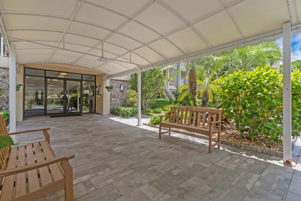 Photo of 804 Cypress Grove Lane #202, Pompano Beach, FL 33069 (MLS # B26028448)