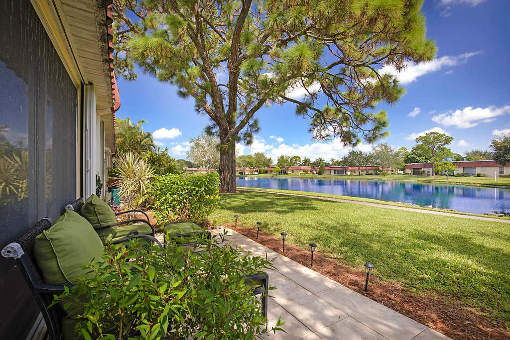 Photo of 352 Covered Bridge Boulevard #A, Greenacres, FL 33467 (MLS # B26060799)
