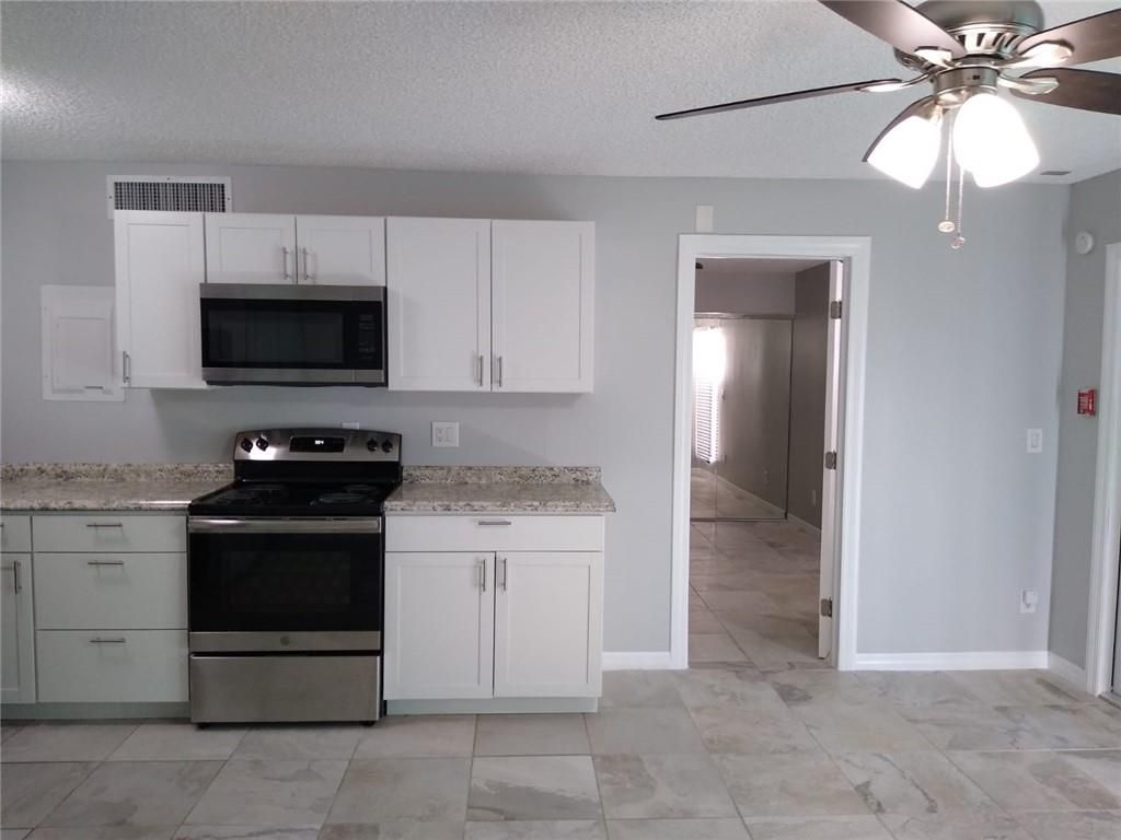 Photo of 645 Executive Center Dr #R205, West Palm Beach, FL 33401 (MLS # F10333501)