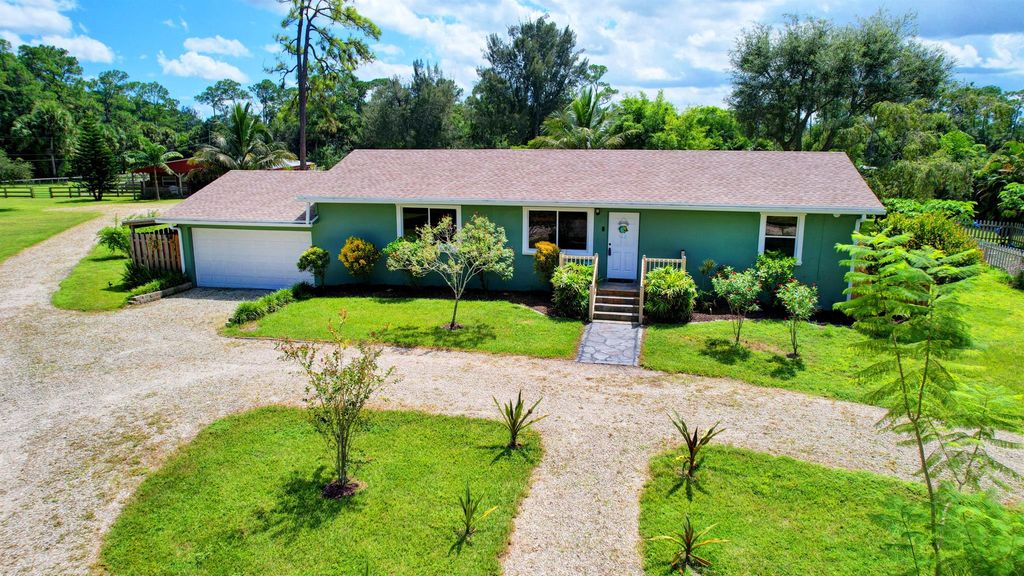 Photo of 13598 North Road, Loxahatchee Groves, FL 33470 (MLS # R10917201)