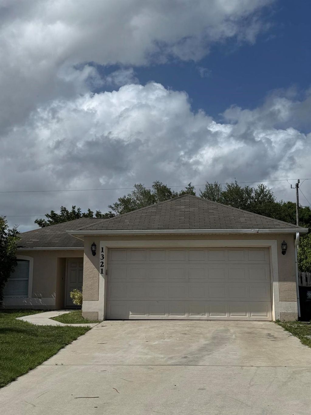 Photo of 1321 SW Calmar Avenue, Port Saint Lucie, FL 34953 (MLS # R11082571)