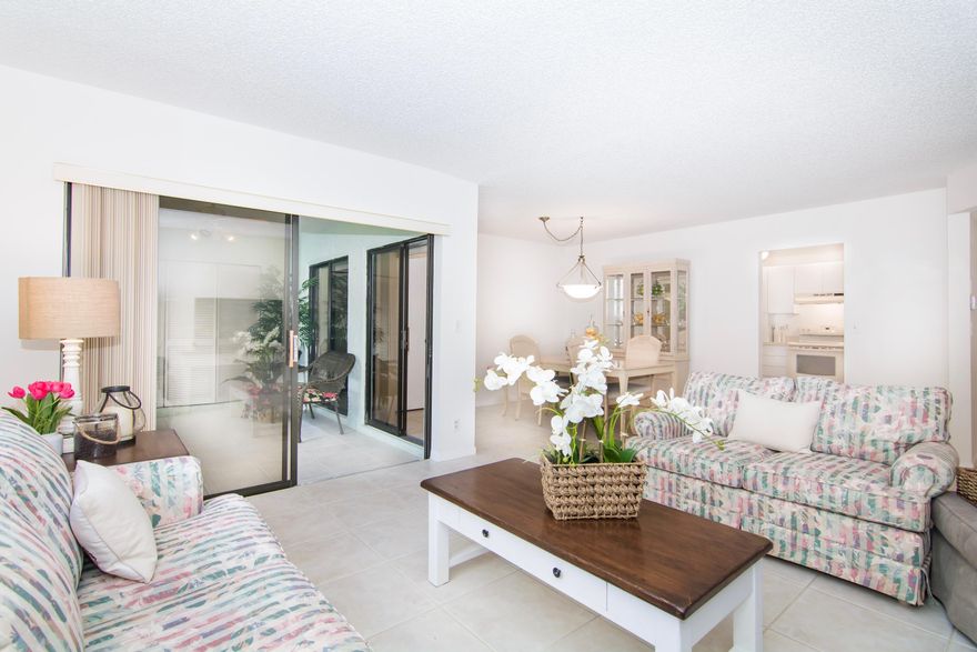 BEAUTIFULLY REFRESHED Preserve View Condo avail in Coconut Creek. 2/2 Nearly 1000sf living sp PLUS PATIO. NEW Rheem Water Htr, NEW Disposal, NEWER 3 panel French door Frig, 2013 AC, Condo freshly painted and professionally cleaned. Kitchen Cabs just resurfaced. Tile flooring seamlessly throughout including PATIO. Ideal indoor/outdoor space, patio features 4 panel sliding glass doors and custom Hunter Douglas blinds. Unit features floor to near ceiling sliding glass doors from Master Suite, Dining and Living rooms all with views of preserve. ENJOY Exotic bird watching from the comforts of home. 

WALK to lake and Condo community pool. ENJOY MASTER Township Resort Style Amenities. 
LOCATION - Conveniently located to tons of shopping, dining, events and more!

MUST SEE VIDEO. MUST HAVE C