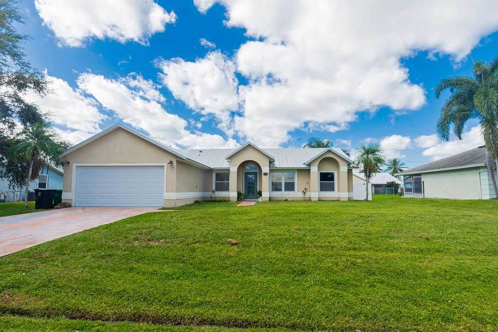 Photo of 526 SW Dairy Road, Port Saint Lucie, FL 34953 (MLS # R11140791)