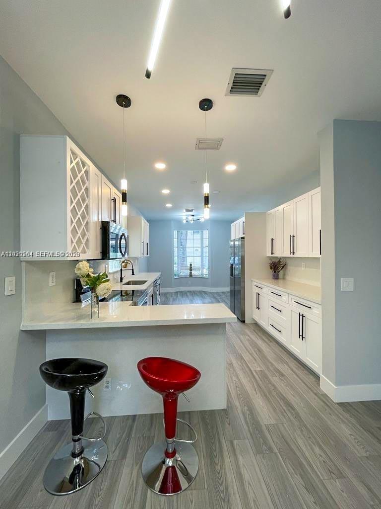 Photo of 1261 Hayes Street, Hollywood, FL 33019 (MLS # A12021964)