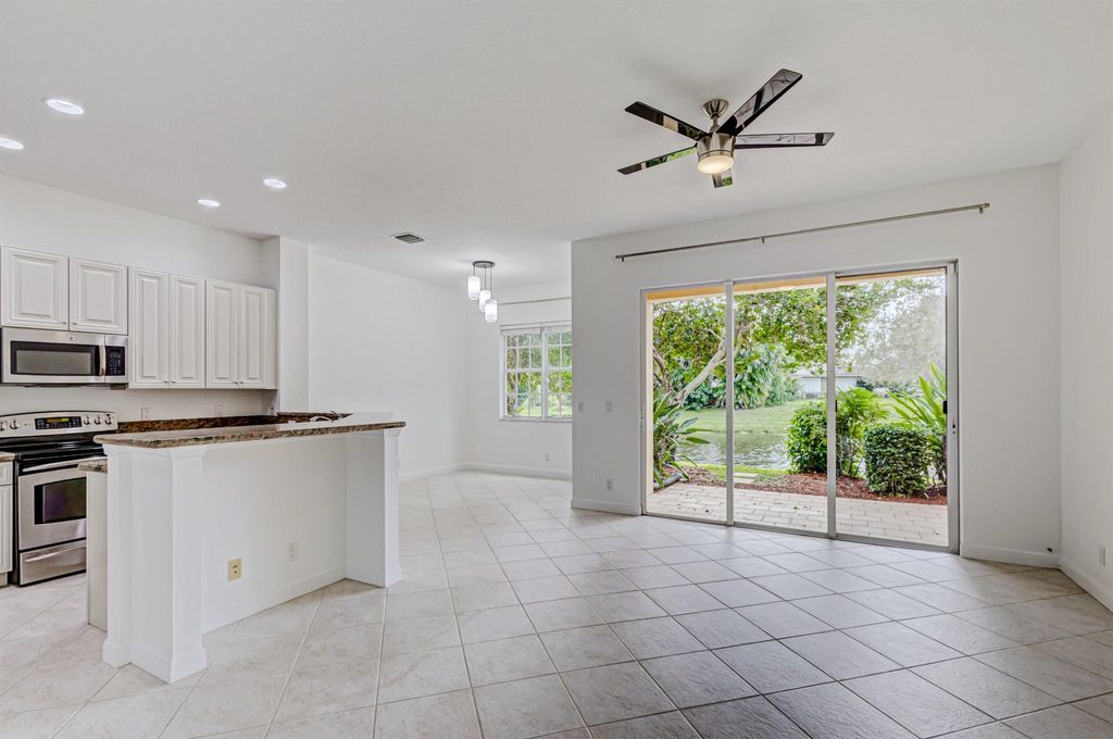 Photo of 402 Commons Way, Palm Beach Gardens, FL 33418 (MLS # R11116740)