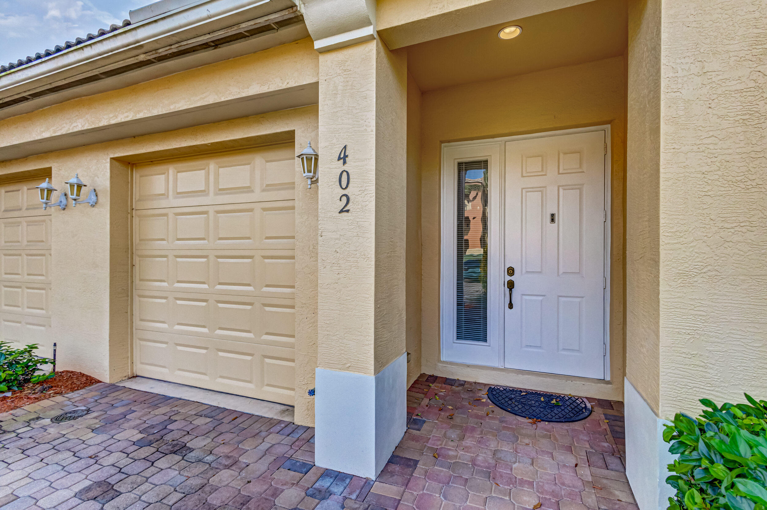Location, location, location! This lovely lakefront townhouse sits just behind Rocco's Tacos in the heart of vibrant PGA Commons--steps from top dining, shopping, and nightlife. The first floor features an open-concept living/dining area, powder room, and a modern kitchen with granite countertops, white cabinets, stainless steel appliances, and a snack bar--all overlooking a peaceful backyard and lake. Upstairs, you'll find two spacious en-suite bedrooms. Complete with a garage, this home offers comfort, style, and unbeatable urban convenience in one of the most desirable areas around.
