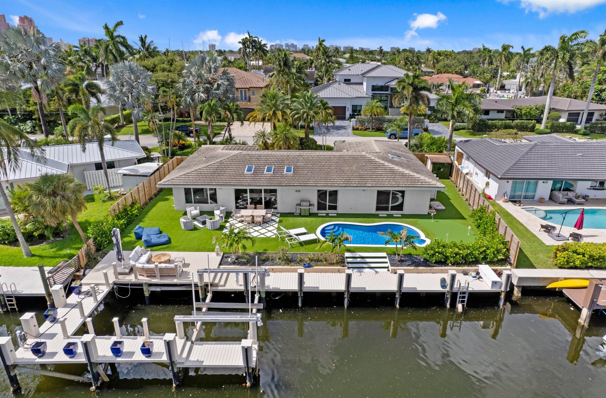 ABSOLUTELY GORGEOUS WATERFRONT ESTATE | BOATERS PARADISE | BREATHTAKING CANAL VIEWS | PRIME FORT LAUDERDALE LOCATION | EXQUISITE HIGH-END QUALITY WORKMENSHIP | NO FIXED BRIDGES | DEEP WATER | 92 Ft WATERFRONTAGE | BOAT LIFT | PRIVATE WRAP AROUND DOCK | TROPICAL OASIS BACKYARD | Bright Open Split Floor Plan | LED Recessed Lighting | Skylights | Smart Home | Eat-In Kitchen | Large Center Island | Custom Wine Cellar | /S Appliances | Primary Bedroom | En-suite | Walk-In Closet | Putting Green | Natural Gas Generator | Heated Saltwater Pool | Immaculate Manicured Landscaping | Cul-de-sac Street | All Hurricane Impact Windows/Doors | No HOA Fee | Circular Paver Driveway | Minutes to Beach, Downtown Las Olas, Fine Dining, Shops | Top Rated Schools | WH 2021 | AC 2017 | PRESENT ALL OFFER