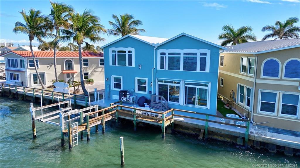Photo of 2 Nettles Boulevard, Jensen Beach, FL 34957 (MLS # R11048812)