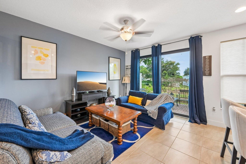 Photo of 2025 OYSTERWOOD Lane, Riviera Beach, FL 33410 (MLS # B26070034)