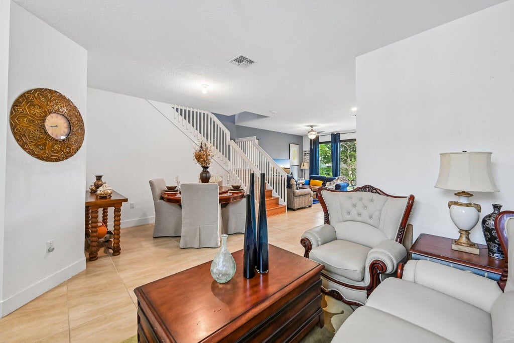 Photo of 2025 OYSTERWOOD Lane, Riviera Beach, FL 33410 (MLS # B26070034)