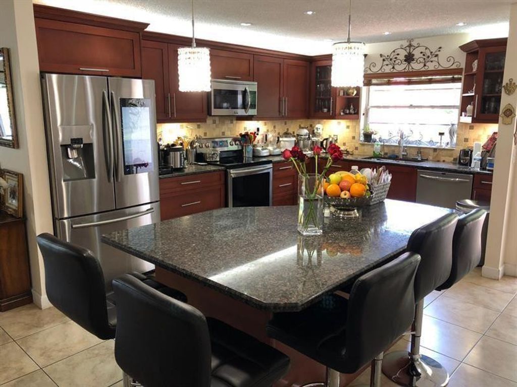 Photo of 9093 Pine Springs Drive, Boca Raton, FL 33428 (MLS # F10528455)