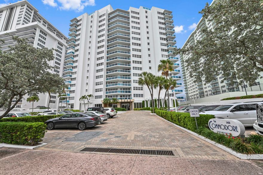 Over $60,000 in capital improvements has been made to the property by the owner. Experience coastal living in this spacious 2-bedroom, 2-bath residence on prestigious Galt Ocean Mile in Fort Lauderdale. Just steps from the beach, this beautifully maintained condo offers over 1,700 square feet with impact windows and a private balcony featuring stunning city and sunset views. The split-bedroom floor plan includes expansive living and dining areas, abundant storage, and a large primary suite with walk-in closet and ensuite bath. Enjoy resort-style amenities including direct beach access, oceanfront pool, fitness center, community room, and 24-hour security. Ideally located near waterfront dining, shopping, and entertainment, this residence offers the best of the South Florida lifestyle.