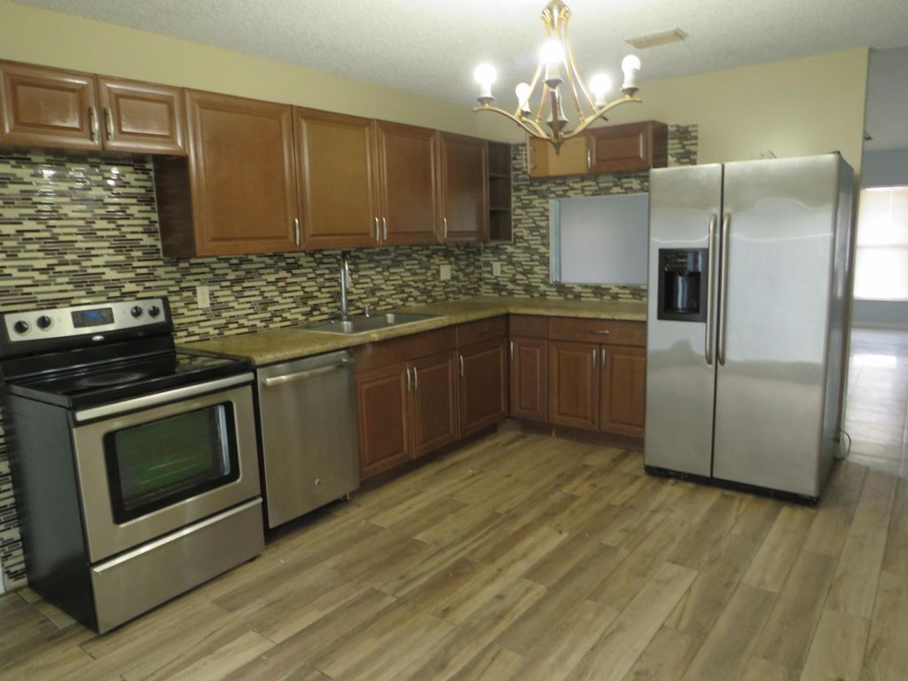 Photo of 5468 Thurston Avenue, Lake Worth, FL 33463 (MLS # R11036929)