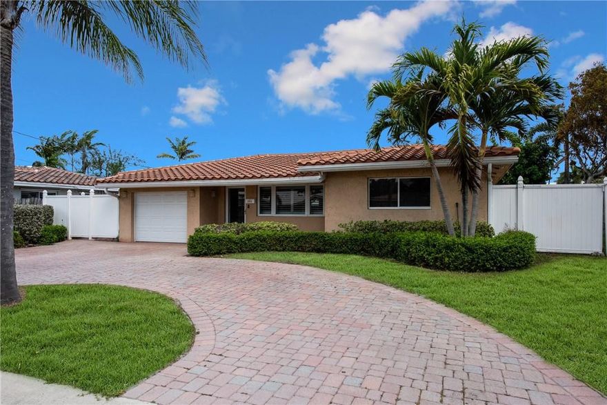 Spacious and updated ocean access home at the end of a canal. Direct canal views. 2 fixed bridges (11th street & Federal) 4 bedroom 3 full bathrooms. Gorgeous kitchen with travertine floors, hurricane impact windows and shutters, one car garage plus TWO living spaces. Master bedroom has an amazing water view with french doors and a huge walk in closet. Backyard is an entertainers dream with a pool and large brick paver patio. Bring your boat and enjoy a short cruise to the ocean, restaurants and more! Back yard has large area to store a boat or RV and shed is included. 48 linear feet of waterfront.