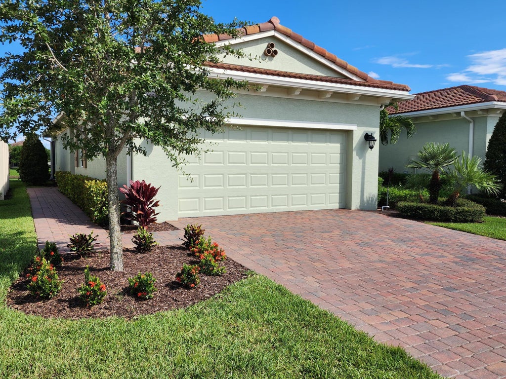 Photo of 21029 SW MODENA Way, Port Saint Lucie, FL 34986 (MLS # B26077173)