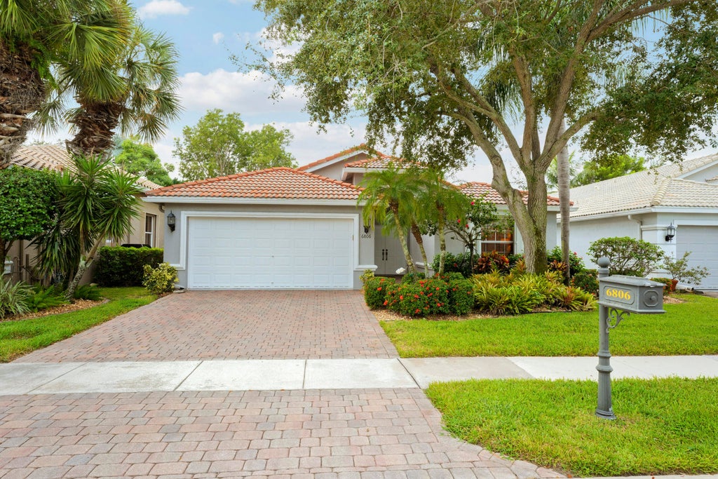 Photo of 6806 Rienzo Street, Lake Worth, FL 33467 (MLS # B26069004)