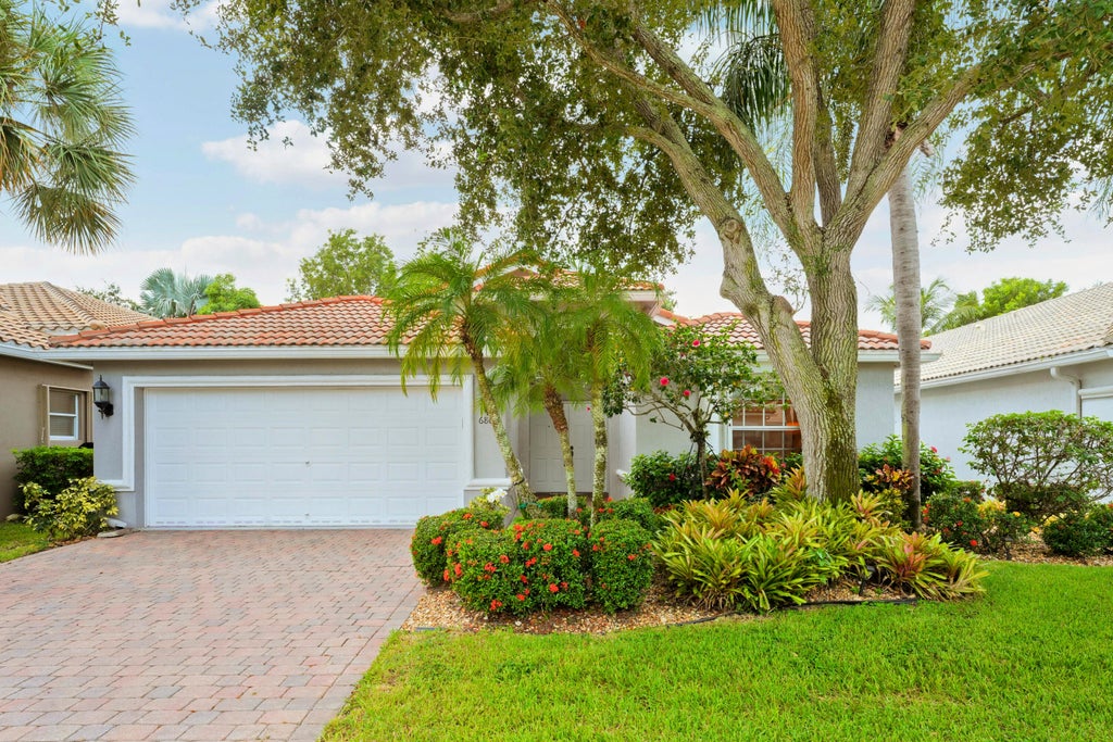 Photo of 6806 Rienzo Street, Lake Worth, FL 33467 (MLS # B26069004)