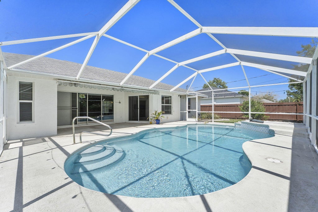 Photo of 1632 SW ALVATON Avenue, Port Saint Lucie, FL 34953 (MLS # B26062982)