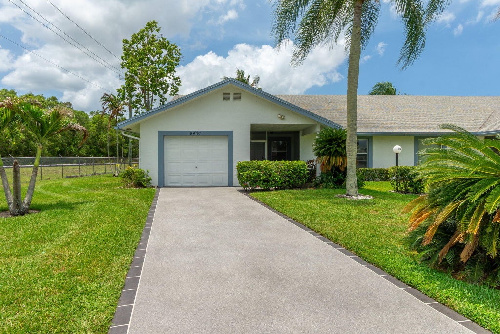 Photo of 5487 Crystal Anne Drive, West Palm Beach, FL 33417 (MLS # B26042067)