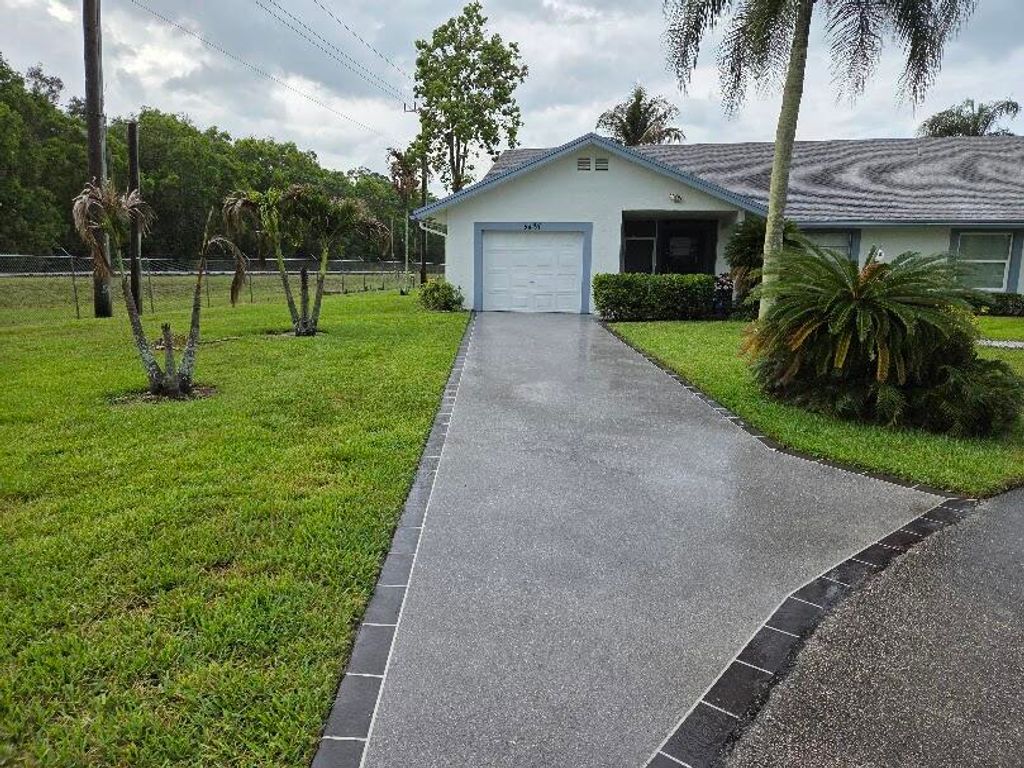 Photo of 5487 Crystal Anne Drive, West Palm Beach, FL 33417 (MLS # B26042067)