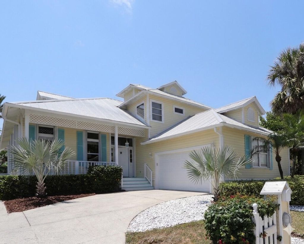 Photo of 400 Seaside Lane, Juno Beach, FL 33408 (MLS # B26032704)