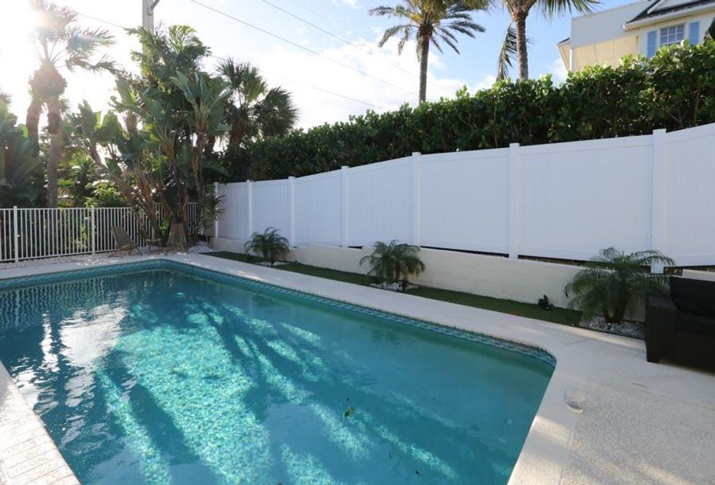 Photo of 400 Seaside Lane, Juno Beach, FL 33408 (MLS # B26032704)