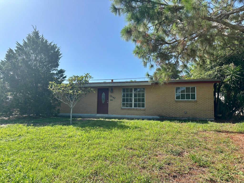 Photo of 12142 Colony Avenue, Palm Beach Gardens, FL 33410 (MLS # R11108586)
