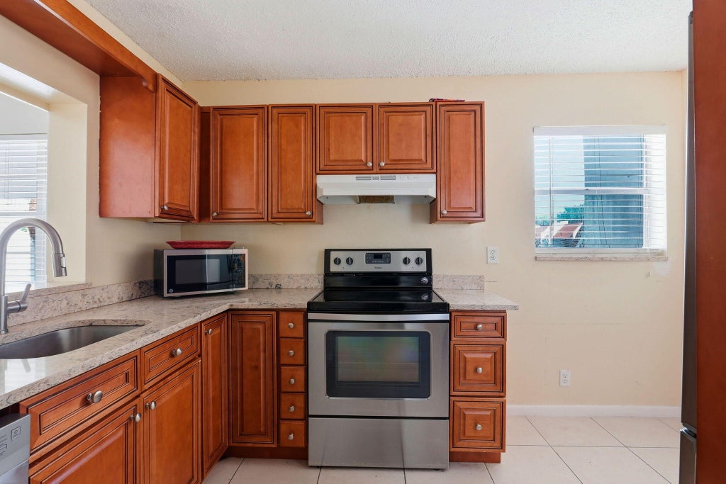 Photo of 2825 SW 22nd Avenue #201, Delray Beach, FL 33445 (MLS # B26074496)