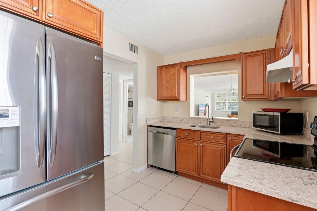Photo of 2825 SW 22nd Avenue #201, Delray Beach, FL 33445 (MLS # B26074496)