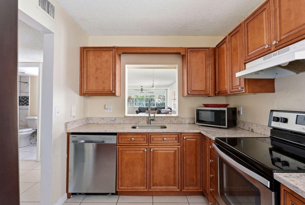 Photo of 2825 SW 22nd Avenue #201, Delray Beach, FL 33445 (MLS # B26074496)