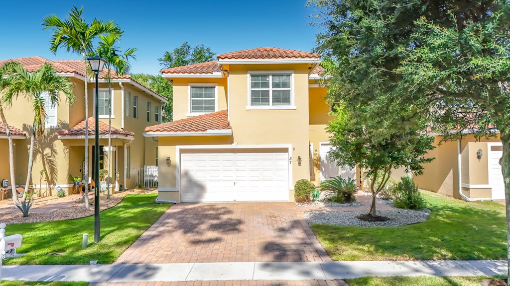 Photo of 57 ATWELL Drive, West Palm Beach, FL 33411 (MLS # B26066680)