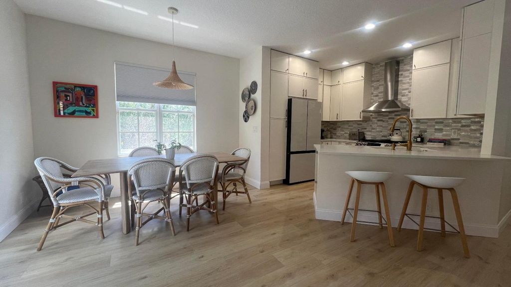 Photo of 203 Evergrene Parkway, Palm Beach Gardens, FL 33410 (MLS # R10979701)