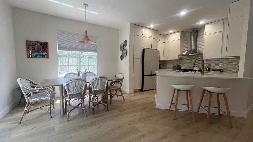 Photo of 203 Evergrene Parkway, Palm Beach Gardens, FL 33410 (MLS # R10979701)