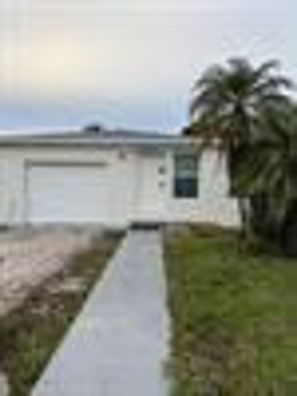 Photo of 3693 Lakewood Road, Palm Springs, FL 33461 (MLS # B26032068)