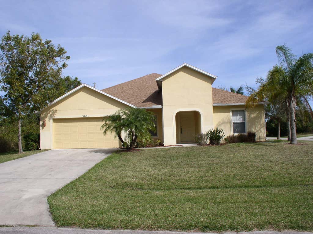 Photo of 3691 SW MARGELA Street, Port Saint Lucie, FL 34953 (MLS # B26060737)