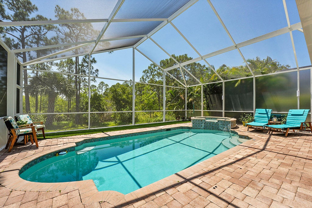 Photo of 3985 NW Deer Oak Drive, Jensen Beach, FL 34957 (MLS # R11089098)