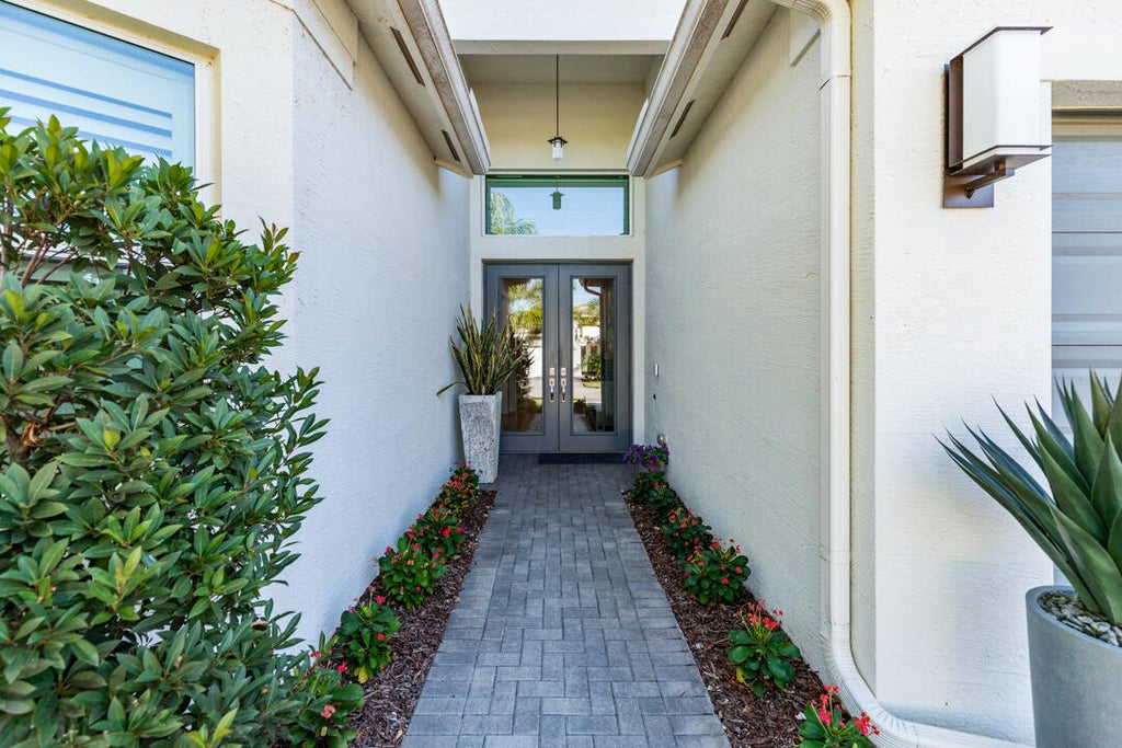 Photo of 11991 SW Whitewater Falls Court, Port Saint Lucie, FL 34987 (MLS # R11136213)