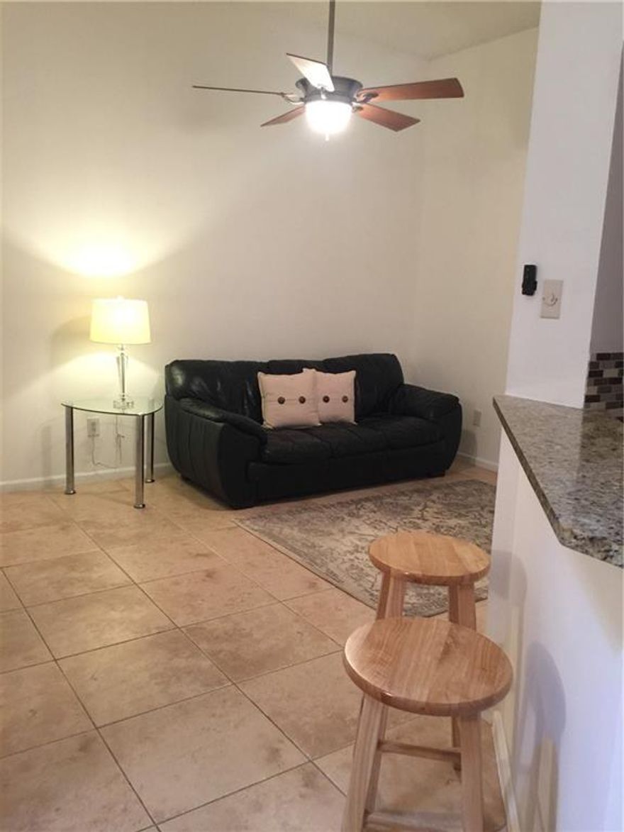 6-month lease only...A Fantastic layout of this modern apartment within a quiet, gated community.  cathedral ceilings, Granite counters with bar area, stainless appliances. Second floor walk up. Great pool area with a jacuzzi.  Modern gymnasium. 2 minutes from shopping. Partially furnished. Landlord willing to purchase bedroom furniture if necessary.