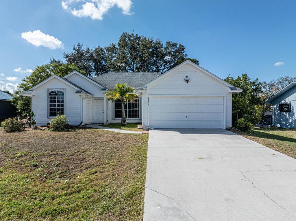Photo of 1116 SE Puritan Lane, Port Saint Lucie, FL 34983 (MLS # R11151987)