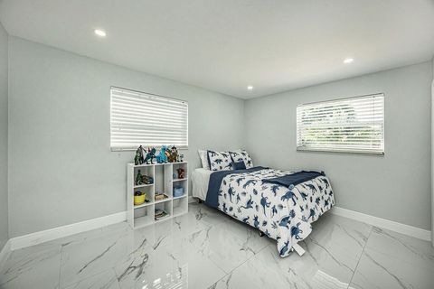 Tiny photo for 1881 Caribbean Road W, Lake Clarke Shores, FL 33406 (MLS # R11133516)