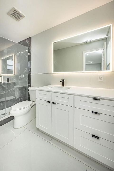 Tiny photo for 1881 Caribbean Road W, Lake Clarke Shores, FL 33406 (MLS # R11133516)