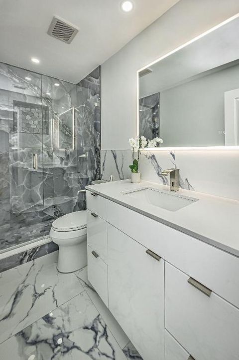 Tiny photo for 1881 Caribbean Road W, Lake Clarke Shores, FL 33406 (MLS # R11133516)