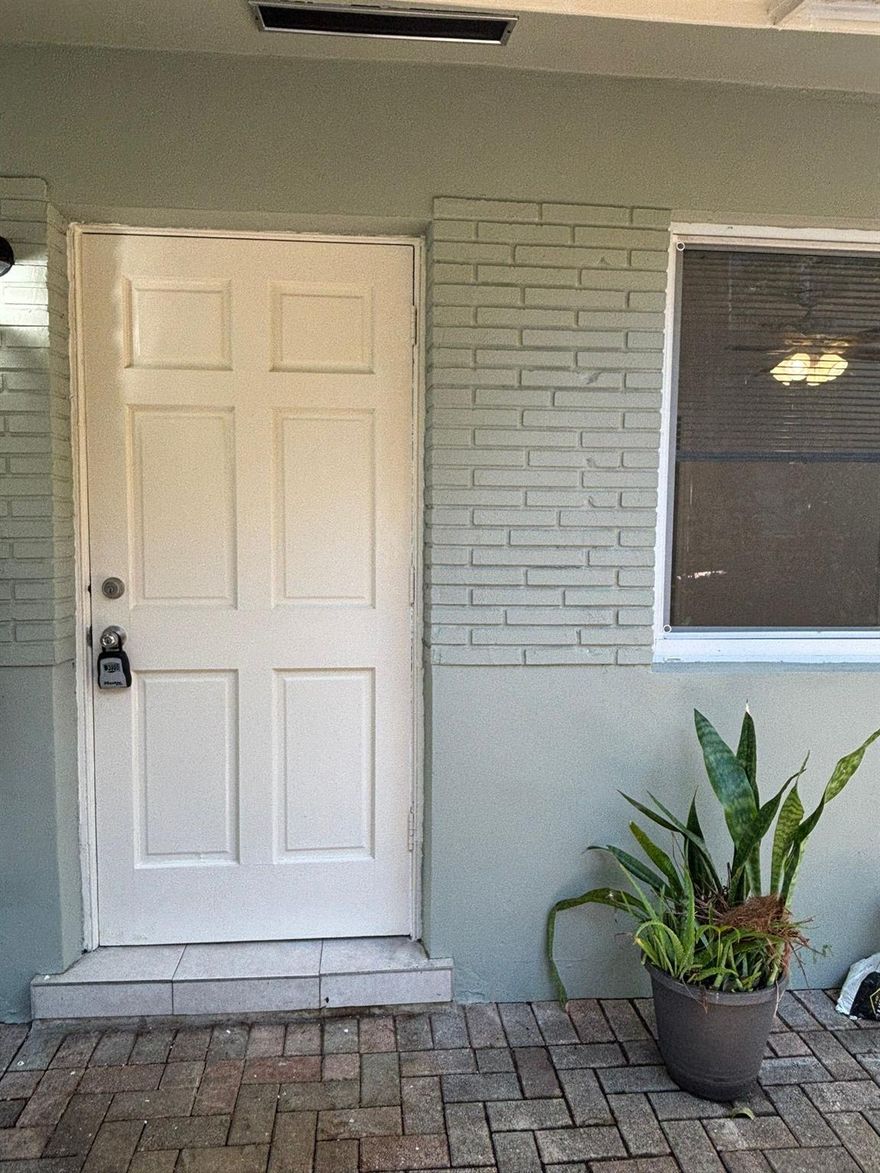 Welcome to your new home! Spacious and remodeled 2 bedroom/2 bathroom apartment in the heart of Fort Lauderdale offers a perfect blend of modern amenities and stylish finishes with it's own back yard!. Ideal for those seeking comfort and convenience, this apartment is ready for immediate move-in. Nestled in a vibrant neighborhood, you'll be close to shopping centers, restaurants, parks, and public transportation. Spacious and open floor plan with abundant natural light, fully updated kitchen with stainless steel appliances, quartz countertops, custom cabinetry, perfect for culinary enthusiasts. Generously sized bedrooms, closet space and large windows, providing a serene and comfortable retreat. Modern and sleek bathrooms with high-end fixtures and tiled showers. Washer and Dryer in unit.