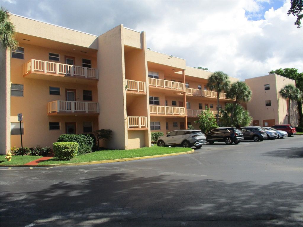 Photo of 8390 Lagos De Campo Blvd #304, Tamarac, FL 33321 (MLS # F10532116)