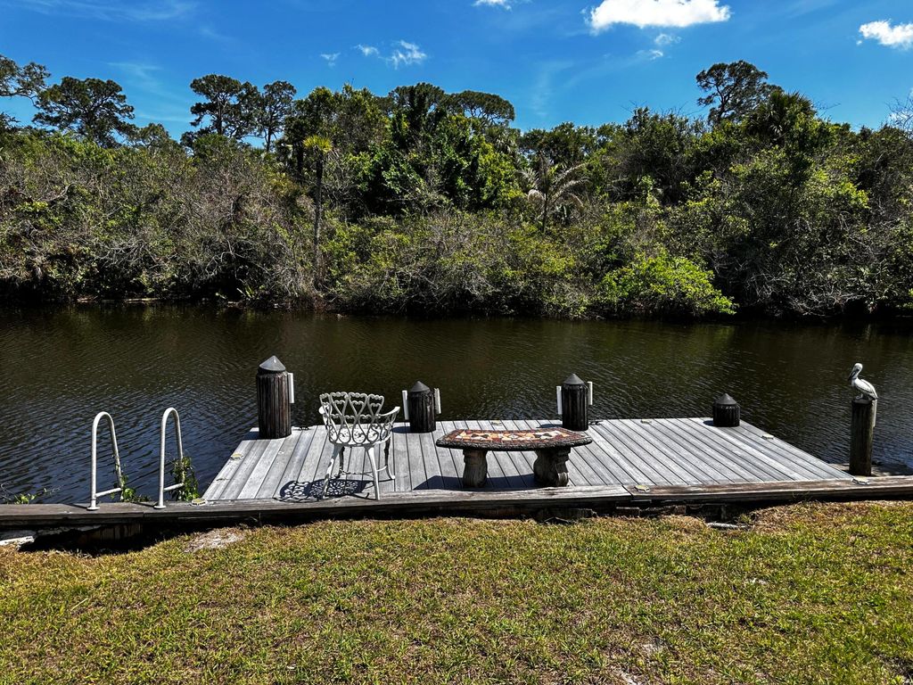 Photo of 7921 SE Paradise Drive, Stuart, FL 34997 (MLS # B26007537)