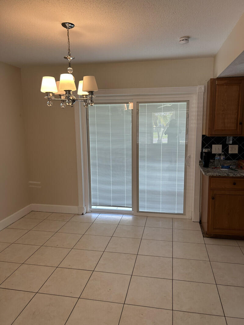 Photo of 884 SE Solaz Avenue, Port Saint Lucie, FL 34983 (MLS # B26047830)