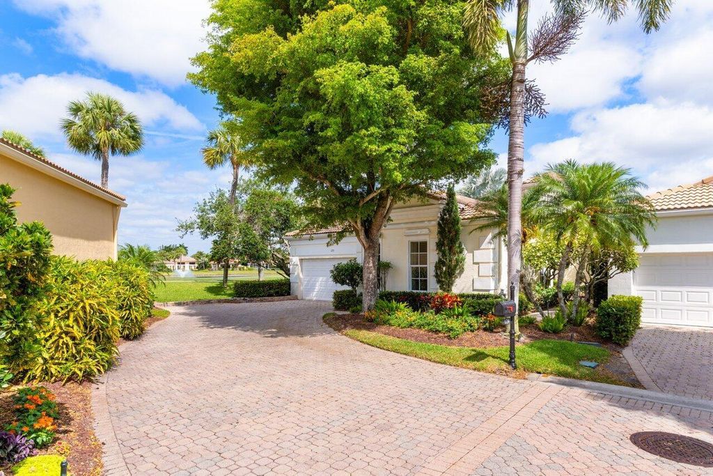 Photo of 120 Sunset Cove Lane, Palm Beach Gardens, FL 33418 (MLS # R11084544)