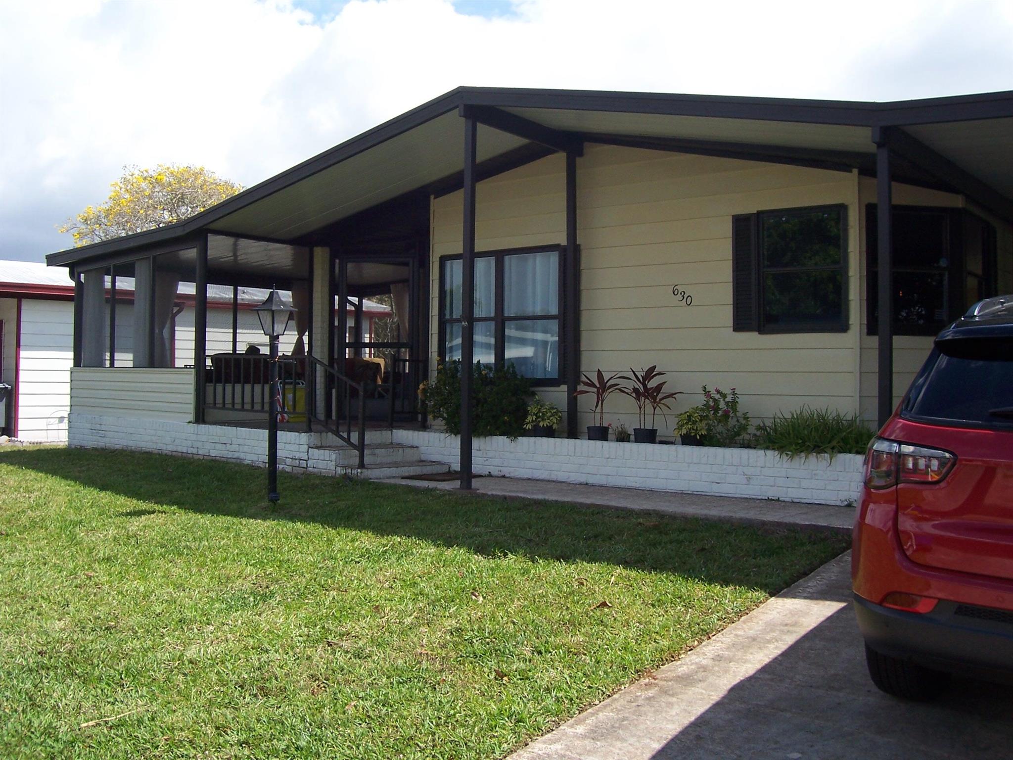 Beautiful light and bright spacious Mobile home. Updated kitchen, new floors. Home offers big screened enclosed porch to enjoy outdoors all day and evening. Updated kitchen and dining area. Winding streets make those early morning or after dinner strolls a pleasure. Starting May 31-September 31. Great active community with lots of activities. Close to shopping, restaurants, the beach and PBI.