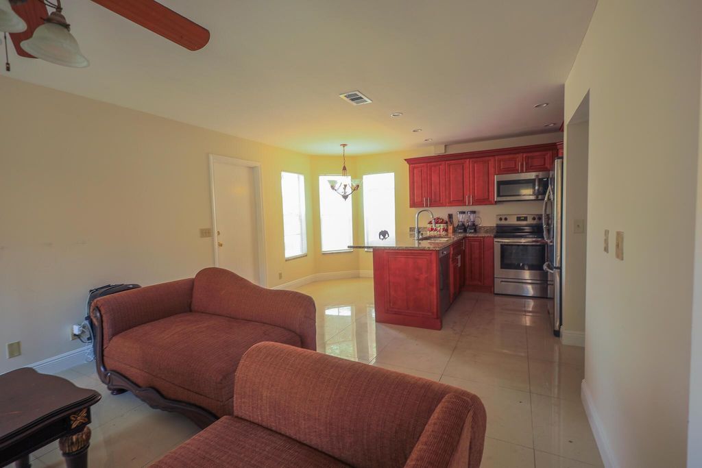 Photo of 1356 Climbing Rose Lane, West Palm Beach, FL 33415 (MLS # R11114022)